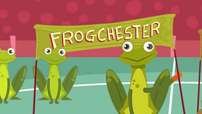 Frogs hold up a "Frogchester" banner.