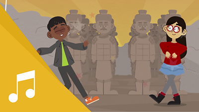 A boy and girl dance in front of the Terracotta Army statues.