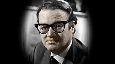 Picture of John Mortimer with thick glasses on