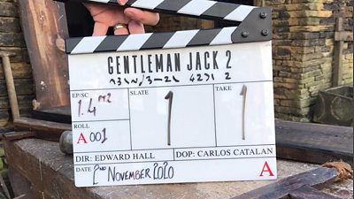 A clapperboard with 'Gentleman Jack 2' on the top