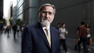 Rabbi Lord Jonathan Sacks in a city street