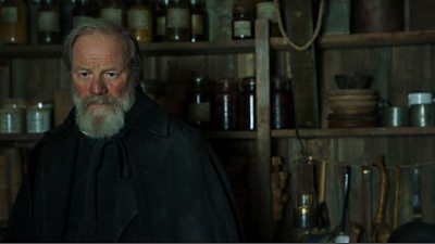 The Priest (Peter Mullan)