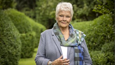 Judi Dench in a garden