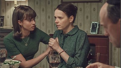 Roza, played by Julia Kryne, is comforted by her cousin Vivien, played by Agnes O'Casey in Ridley Road