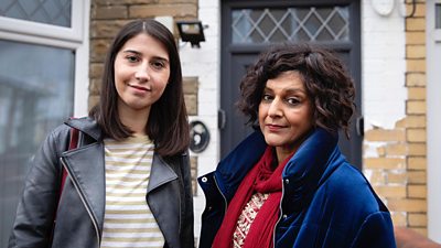 Priya Hall and Meera Syal stand outside a terraced house playing Beena and Amrit in the comedy short of the same name.