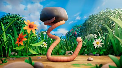 Superworm (voiced by Matt Smith) lifts a large rock over his head