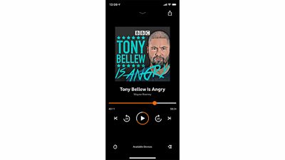 This image features a screenshot of the Tony Bellew Is Angry podcast, as it would appear to a listener on the BBC Sounds app. It features an arrow and three blocks on the lower right hand side of the screen, which users can press to access their play queue.