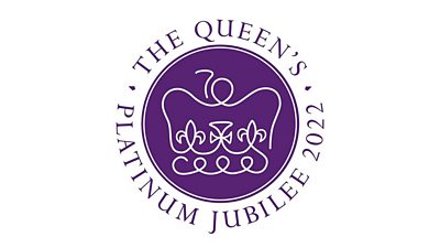 The Queen's Platinum Jubilee 2022 is written in purple text circling a purple emblem of a crown.