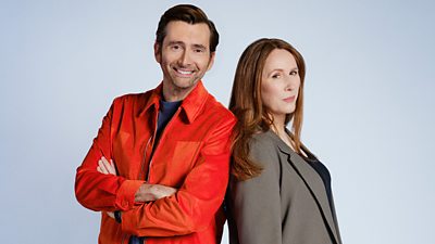 David Tennant and Catherine Tate stand back to back