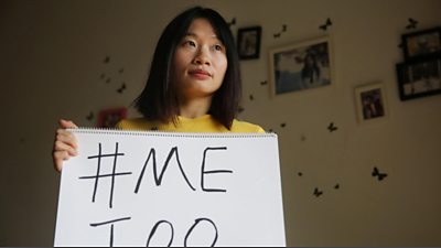 Sophia Huang Xueqin holding a #MeToo sign