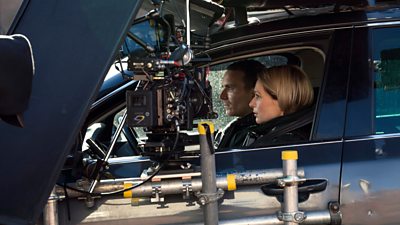 Martin McCann and Sian Brooke filming inside a car for Blue Lights