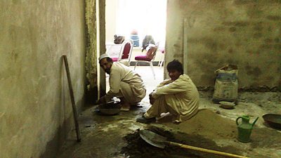 Two buildings cementing a floor