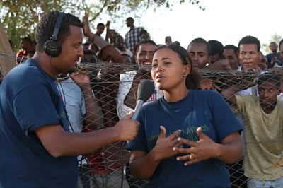 Desalegn Assefa interviews a young woman, Addis Ababa.