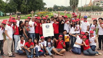 Proud record breakers with their certificate.