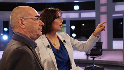 A woman and man in a TV studio