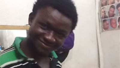 Big ID in his barbershop in Abuja.