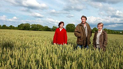 Actors who portray David, Ruth and Pip in a cornfield