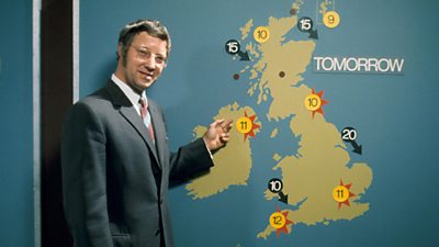 Graham Parker in front of tomorrow's weather. The map of the UK is quite sparse, with just a few temperature symbols. 