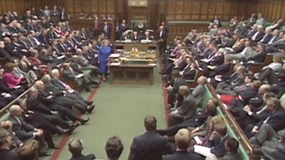 The House of Commons as seen from a TV camera. Margaret Thatcher stands at the dispatch box to a full house. 