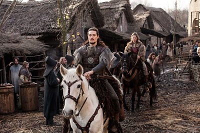Uhtred (Alexander Dreymon), Brida (Emily Cox)(Image Credit:BBC/Carnival Films/Joss Barratt) 