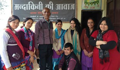 Station staff with BBC Media Action Lifeline trainers, Rishika (third from right) and Shefali (far right).