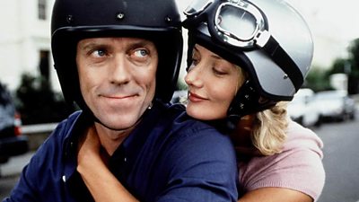 Hugh Laurie and Joely Richardson ride a motorbike