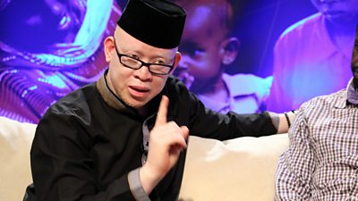Isaac Mwaura, a guest, discussing voter registration on an early Beyond the Headlines episode