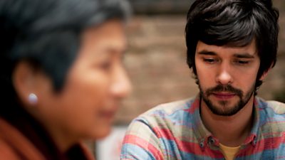 Cheng Pei Pei and Ben Whishaw sit in contemplation