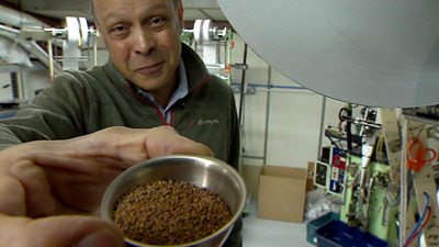 Pallab Ghosh shows off a bowl of seeds