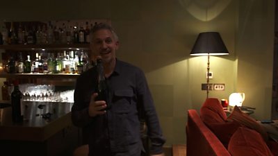 Lineker celebrates with champagne
