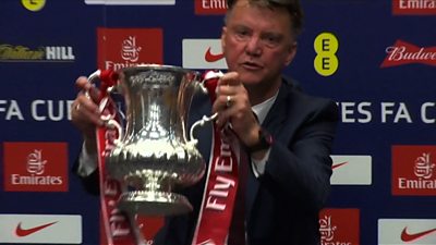 Louis van Gaal presents the FA Cup trophy