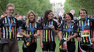 Five cyclists brandish their medals after the race