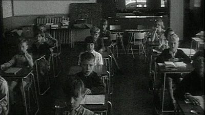 Children sat in a classroom in 1954