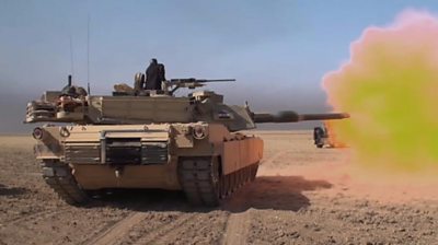 Iraqi forces tank firing shell