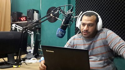 Mohammed Masri, recording a show at Radio Gaza FM