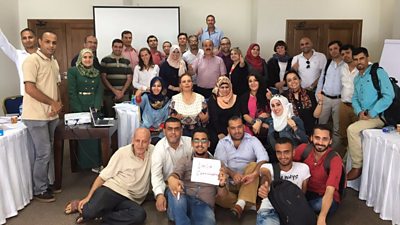 Local media and humanitarian workers after completion of Lifeline training