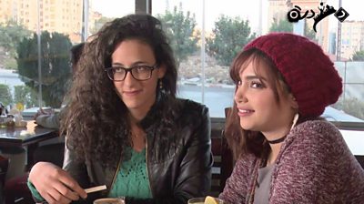 Two actresses from Dandara relaxing on set