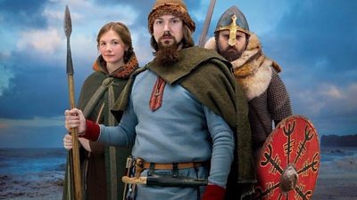 People in Viking costumes