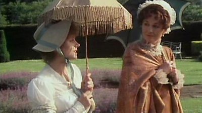 Muslin gowns and bonnets in a country garden.