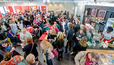 Crowds gathering in the foyer at Stratford Circus (photo: Kwame Lestrade)