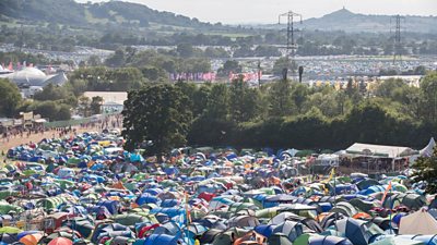 Camp Bestival: Tents battered by rain and high winds at festival - BBC News