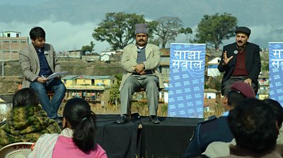 Former presenter of Sajha Sawal, Narayan Shrestha, interviews panellists in Sindhuli district.