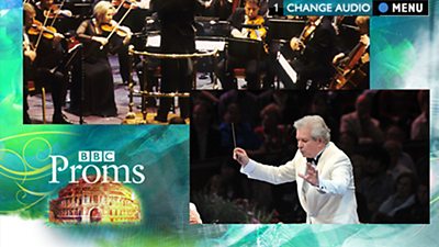 A widescreen TV screen with various menus showing overlayed.