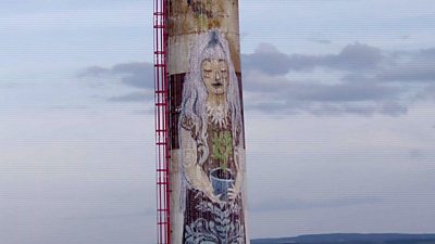 The chimney painted by a robot spray painter