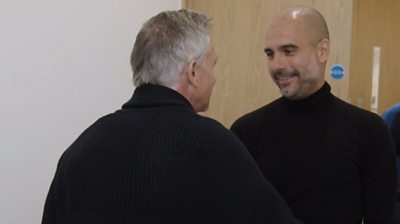 Pep Guardiola shakes hands with Gary Lineker
