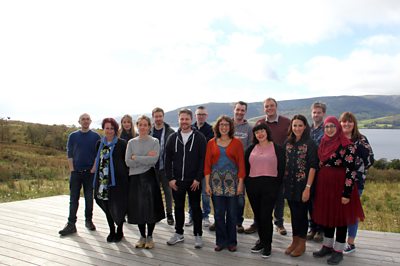 The writers with BBC staff in the glorious surroundings of Cove Park