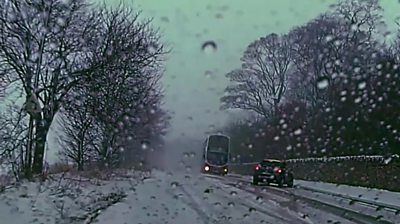 Dashcam footage shows the near miss between a bus and car near Edinburgh