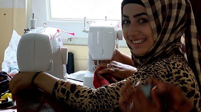 Women in Iraq's refugee camps taught to sew - BBC News