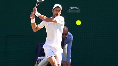 Novak Djokovic playing tennis.