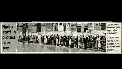 A headline reads 'radio staff in protest over pay'. A long line of people with placards stand outside Broadcasting House. 